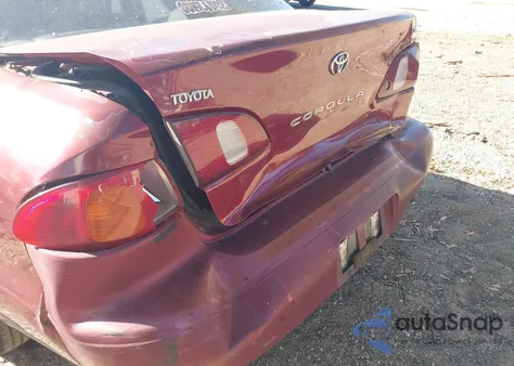 1999 Toyota Corolla Ce from USA, damaged, VIN 2T1BR12E5XC122690